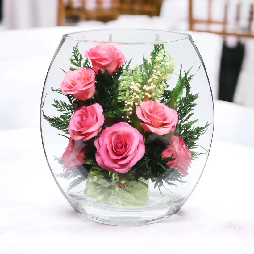 Seven Stunning Pink Roses in a Glass Vase for Enduring Elegance