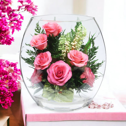 Seven Stunning Pink Roses in a Glass Vase for Enduring Elegance