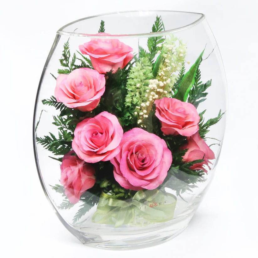 Seven Stunning Pink Roses in a Glass Vase for Enduring Elegance