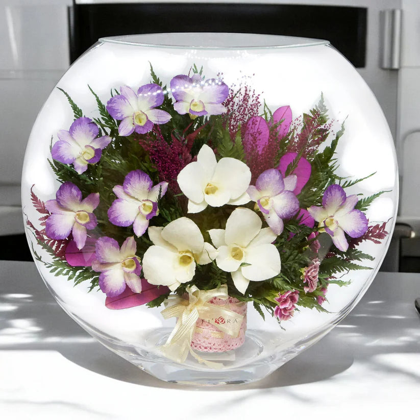 Breathtaking Orchids in a Stunning Large Round Glass Vase