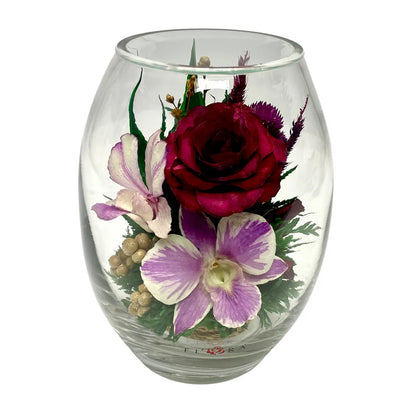 Enduring Roses and Orchids in a Sleek Glass Vase